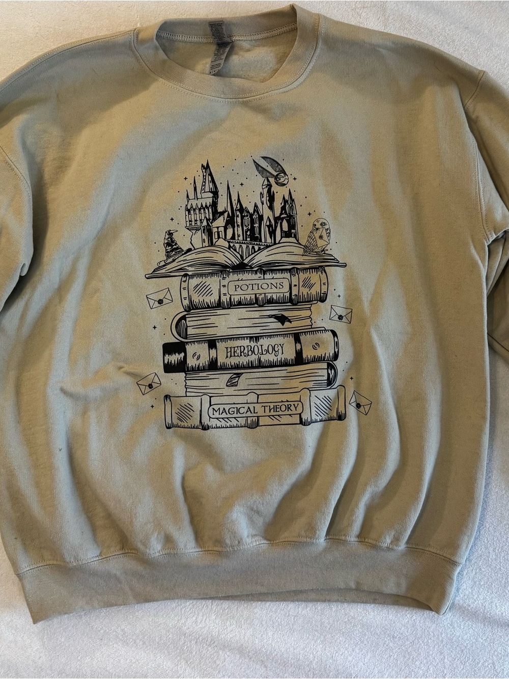 Harry Potter Hogwarts Magical Textbooks & Wand Crewneck. Sand color